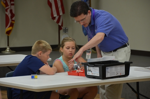 Students and teacher coding with Lego